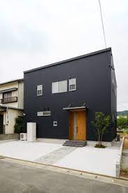 奈良の香芝市の株式会社ヨネヤの外壁塗装と屋根塗装の黒い外壁